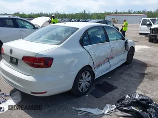 2017 Volkswagen Jetta S with VIN 3VW2B7AJXHM374687, listed as a IAAI auction lot 42596302 with 63,728 mi miles and . Bid and sale history available at DreamBid. Image 4.