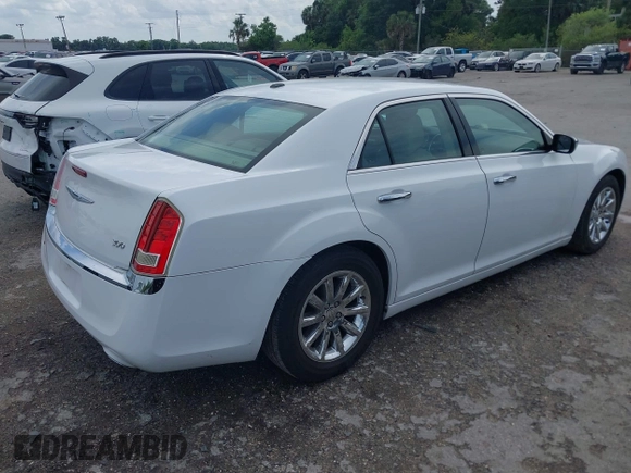 2012 Chrysler 300 Limited with VIN 2C3CCACG5CH129861, listed as a IAAI auction lot 41891121 with 146,141 mi miles. Bid and sale history available at carsss.com. Image 4.