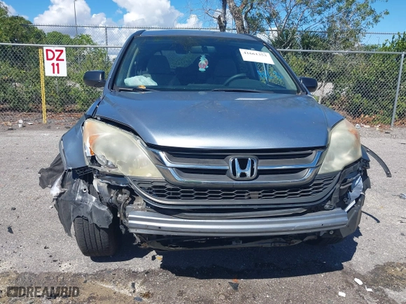 2011 Honda CR-V SE with VIN 5J6RE3H47BL012871, listed as a IAAI auction lot 41661353 with 123,396 mi miles. Bid and sale history available at carsss.com. Image 6.