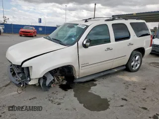 2013 Chevrolet Tahoe LTZ with VIN 1GNSKCE01DR161494, listed as a Copart auction lot 62310965 with 152,897 mi miles and Clean title. Bid and sale history available at DreamBid. Image 1.