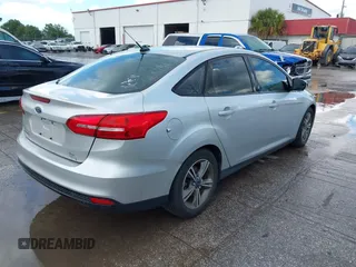 2016 Ford Focus SE с VIN 1FADP3FE7GL406809, выставлен на аукционе IAAI как лот 42570319 с пробегом 114 550 миль миль и . История ставок и продаж доступна на DreamBid. Изображение 4.