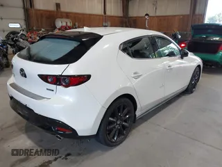 2021 Mazda 3 Premium with VIN JM1BPBML6M1348258, listed as a IAAI auction lot 42752477 with 35,285 mi miles and . Bid and sale history available at DreamBid. Image 4.