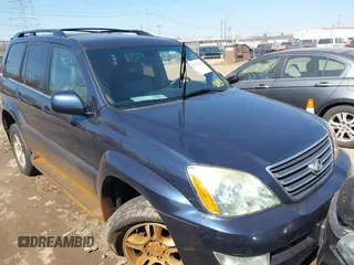 2003 Lexus GX 470 with VIN JTJBT20XX30016572, listed as a IAAI auction lot 41782620 with 127,024 mi miles. Bid and sale history available at carsss.com. Image 1.