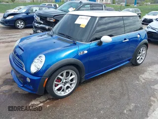 2006 MINI Hardtop S z VIN WMWRE33596TL23436, wystawiony jako IAAI lot #42011749 z przebiegiem 73 381 mil mil oraz . Historia ofert i sprzedaży dostępna na DreamBid. Obrazek 2.