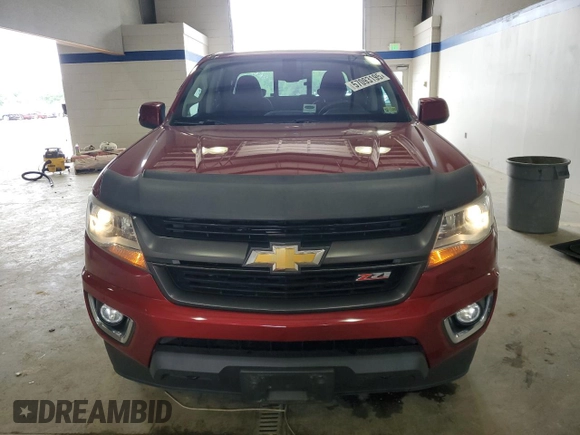 2020 Chevrolet Colorado 4WD Z71 z VIN 1GCGTDENXL1111901, wystawiony jako Copart lot #57093195 z przebiegiem 60 992 mil mil oraz Szkoda całkowita • Salvage title. Historia ofert i sprzedaży dostępna na DreamBid. Obrazek 5.
