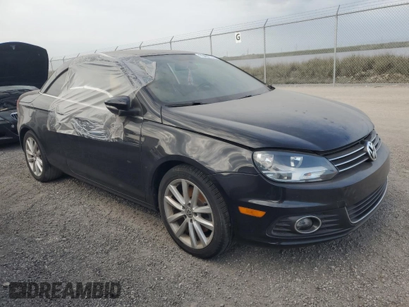 2015 Volkswagen Eos Komfort with VIN WVWBW8AH8FV002052, listed as a Copart auction lot 76487114 with Not Provided miles and Salvage Title. Bid and sale history available at DreamBid. Image 4.