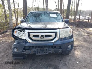 2009 Honda Pilot Touring with VIN 5FNYF48939B007471, listed as a IAAI auction lot 41683495 with 189,806 mi miles and . Bid and sale history available at carsss.com. Image 12.