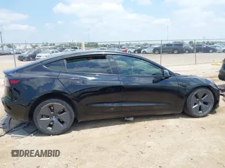 2023 Tesla Model 3 with VIN 5YJ3E1EA8PF454210, listed as a IAAI auction lot 42326822 with 43,200 mi miles and . Bid and sale history available at DreamBid. Image 14.