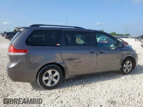 2013 Toyota Sienna LE AAS with VIN 5TDKK3DC7DS307239, listed as a Copart auction lot 62517325 with 173,363 mi miles and Salvage title. Bid and sale history available at DreamBid. Image 3.
