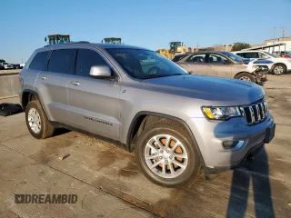 2021 Jeep Grand Cherokee Laredo E with VIN 1C4RJFAG1MC817601, listed as a Copart auction lot 56421195 with 91,292 mi miles and Salvage title. Bid and sale history available at DreamBid. Image 4.