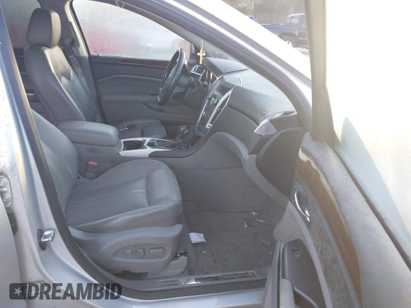 2012 Cadillac SRX Premium Collection with VIN 3GYFNFE36CS509048, listed as a IAAI auction lot 40636427 with 104,001 mi miles. Bid and sale history available at carsss.com. Image 5.