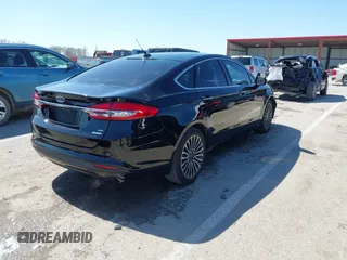 2017 Ford Fusion SE z VIN 3FA6P0HD1HR138693, wystawiony jako IAAI lot #41837634 z przebiegiem 117 638 mil mil oraz . Historia ofert i sprzedaży dostępna na DreamBid. Obrazek 4.
