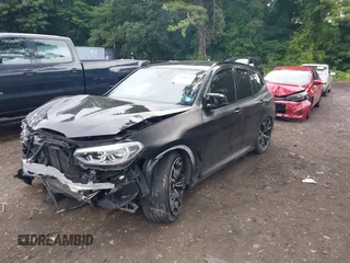 2021 BMW X3 M with VIN 5YMTS0C09M9E42418, listed as a IAAI auction lot 39904954 with 1 mi miles. Bid and sale history available at carsss.com. Image 2.