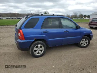 2009 Kia Sportage LX z VIN KNDJF724797603415, wystawiony jako Copart lot #53022925 z przebiegiem 120 916 mil mil oraz Szkoda całkowita • Salvage title. Historia ofert i sprzedaży dostępna na DreamBid. Obrazek 3.
