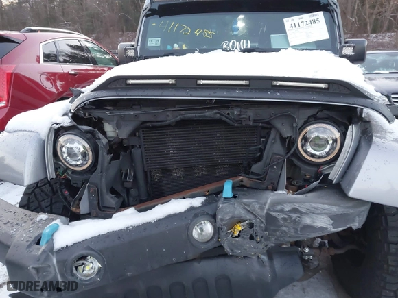 2015 Jeep Wrangler Unlimited Rubicon Hard Rock with VIN 1C4HJWFG1FL659803, listed as a IAAI auction lot 41172485 with 126,881 mi miles. Bid and sale history available at carsss.com. Image 6.