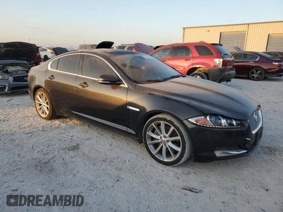 2015 Jaguar XF V6 Portfolio with VIN SAJWA0F76F8U59802, listed as a Copart auction lot 77198104 with 98,859 mi miles and Clean Title. Bid and sale history available at carsss.com. Image 4.