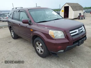 2007 Honda Pilot EX-L with VIN 5FNYF18537B021184, listed as a IAAI auction lot 42142092 with 245,462 mi miles. Bid and sale history available at carsss.com. Image 1.