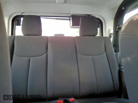 2015 Jeep Wrangler Freedom Edition with VIN 1C4AJWAG8FL541675, listed as a Copart auction lot 62647855 with 53,915 mi miles and Salvage title. Bid and sale history available at DreamBid. Image 10.