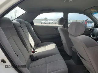 2000 Mazda 626 LX z VIN 1YVGF22C3Y5165341, wystawiony jako Copart lot #56575075 z przebiegiem 58 645 mil mil oraz Szkody całkowita. Historia ofert i sprzedaży dostępna na DreamBid. Obrazek 10.