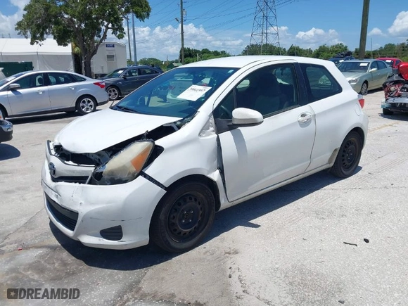 2014 Toyota Yaris L with VIN JTDJTUD32ED588779, listed as a IAAI auction lot 39861997 with 227,114 mi miles. Bid and sale history available at carsss.com. Image 2.