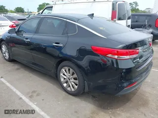 2016 Kia Optima EX with VIN 5XXGU4L38GG075652, listed as a IAAI auction lot 39544592 with 151,960 mi miles. Bid and sale history available at carsss.com. Image 3.
