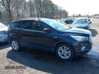 2018 Ford Escape SE with VIN 1FMCU0GD2JUA65979, listed as a IAAI auction lot 41894516 with 145,424 mi miles. Bid and sale history available at carsss.com. Image 13.