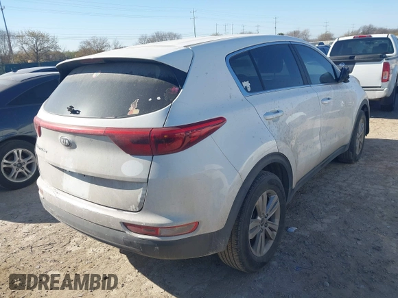 2018 Kia Sportage LX with VIN KNDPM3AC2J7445877, listed as a IAAI auction lot 41749884 with 150,320 mi miles and . Bid and sale history available at DreamBid. Image 4.