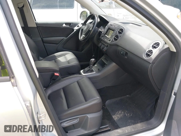 2016 Volkswagen Tiguan S with VIN WVGBV7AX1GW523335, listed as a IAAI auction lot 42091690 with 165,495 mi miles and . Bid and sale history available at DreamBid. Image 5.