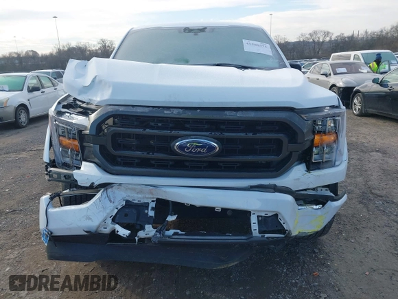 2023 Ford F-150 XL with VIN 1FTEW1C53PFB19119, listed as a IAAI auction lot 41580371 with 35,040 mi miles and . Bid and sale history available at DreamBid. Image 6.
