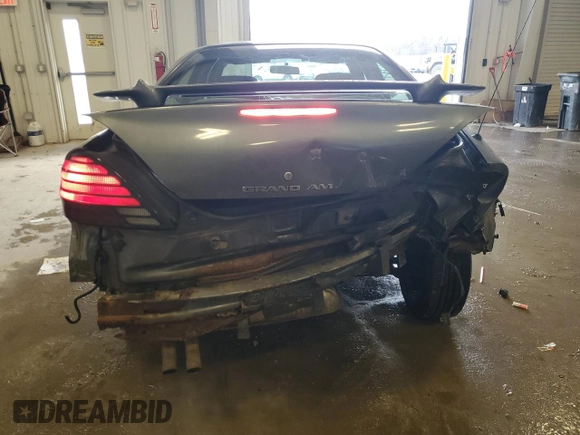 2004 Pontiac Grand Am SE1 with VIN 1G2NF52E74M502694, listed as a Copart auction lot 85244404 with 186,421 mi miles and Non Repairable. Bid and sale history available at carsss.com. Image 6.