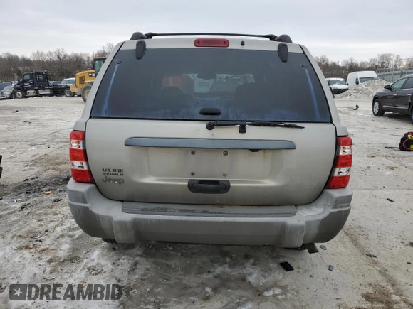 2000 Jeep Grand Cherokee Laredo z VIN 1J4GW48S8YC335926, wystawiony jako Copart lot #80693454 z przebiegiem 353 635 mil mil oraz Nie do naprawy • Non repairable. Historia ofert i sprzedaży dostępna na DreamBid. Obrazek 6.