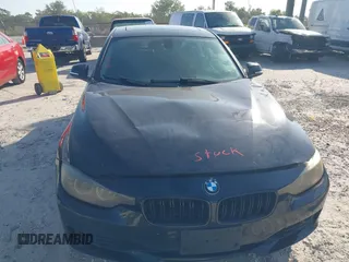 2013 BMW 3 Series 328i with VIN WBA3A5C53DF351970, listed as a IAAI auction lot 42142508 with 174,265 mi miles. Bid and sale history available at carsss.com. Image 6.