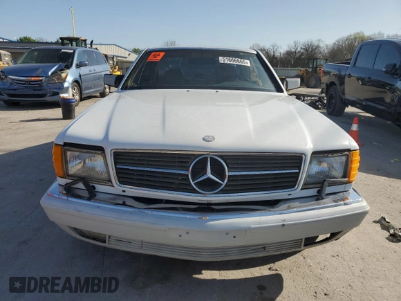 1990 Mercedes-Benz 560 with VIN WDBCA45E6LA553870, listed as a Copart auction lot 51666665 with 228,119 mi miles and Clean Title. Bid and sale history available at DreamBid. Image 5.