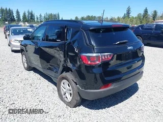 2018 Jeep Compass Sport with VIN 3C4NJDAB1JT261863, listed as a IAAI auction lot 42677037 with 93,263 mi miles and . Bid and sale history available at DreamBid. Image 3.