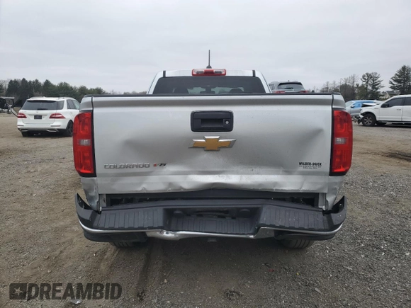 2017 Chevrolet Colorado 4WD WT with VIN 1GCHTBEN4H1321975, listed as a Copart auction lot 49158035 with 64,677 mi miles and Salvage title. Bid and sale history available at DreamBid. Image 6.