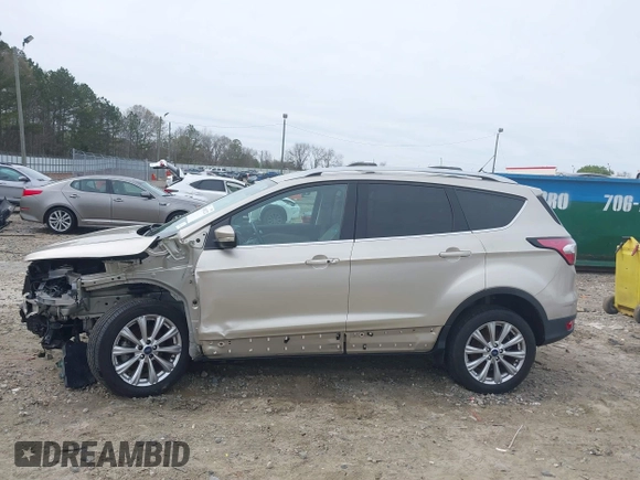 2017 Ford Escape Titanium with VIN 1FMCU0JD2HUC30884, listed as a IAAI auction lot 41801272 with 111,644 mi miles. Bid and sale history available at carsss.com. Image 15.
