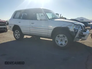 1999 Toyota RAV4 with VIN JT3GP10V7X7057488, listed as a Copart auction lot 89202915 with 391,031 mi miles and Salvage Title. Bid and sale history available at DreamBid. Image 4.