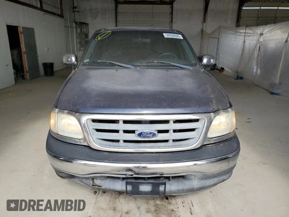 2002 Ford F-150 XL with VIN 1FTRX17W72NA16561, listed as a Copart auction lot 50938395 with 160,088 mi miles and Clean Title. Bid and sale history available at carsss.com. Image 5.