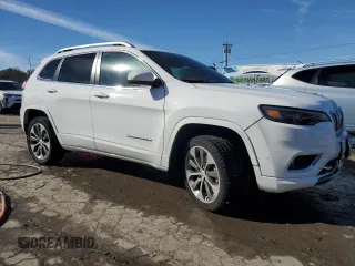 2019 Jeep Cherokee Overland with VIN 1C4PJMJN1KD269004, listed as a Copart auction lot 79611944 with 52,076 mi miles and Salvage title. Bid and sale history available at DreamBid. Image 4.