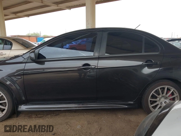 2013 Mitsubishi Lancer Evolution GSR with VIN JA32W8FV6DU009257, listed as a IAAI auction lot 41917942 with 125,279 mi miles. Bid and sale history available at carsss.com. Image 14.