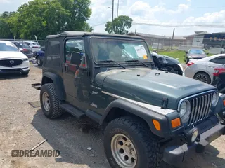 2002 Jeep Wrangler Sport with VIN 1J4FA49S42P774131, listed as a IAAI auction lot 42811772 with 178,875 mi miles and . Bid and sale history available at DreamBid. Image 1.