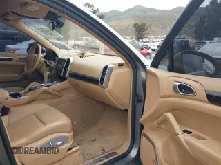 2012 Porsche Cayenne S Hybrid with VIN WP1AE2A25CLA90636, listed as a IAAI auction lot 41922089 with 90,318 mi miles and . Bid and sale history available at DreamBid. Image 5.