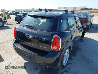 2015 MINI Countryman with VIN WMWZB3C54FWM33074, listed as a IAAI auction lot 42094992 with 86,704 mi miles and . Bid and sale history available at DreamBid. Image 4.