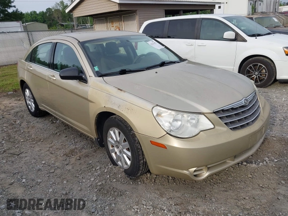 2010 Chrysler Sebring Touring z VIN 1C3CC4FBXAN210425, wystawiony jako IAAI lot #42275197 z przebiegiem 123 200 mil mil oraz . Historia ofert i sprzedaży dostępna na DreamBid. Obrazek 1.