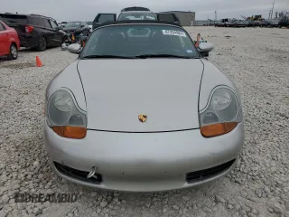 2001 Porsche Boxster с VIN WP0CA29821U621779, выставлен на аукционе Copart как лот 87204984 с пробегом 82 091 миль миль и Списание • Salvage title. История ставок и продаж доступна на DreamBid. Изображение 5.