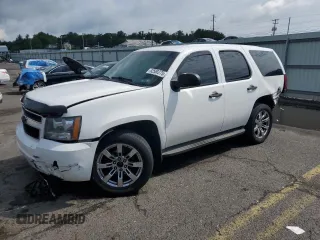 2012 Chevrolet Tahoe Commercial with VIN 1GNSK4E02CR303632, listed as a Copart auction lot 62580275 with 256,949 mi miles and Salvage title. Bid and sale history available at DreamBid. Image 1.