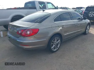 2010 Volkswagen CC Lux with VIN WVWHN7AN4AE530337, listed as a IAAI auction lot 41244342 with 100,819 mi miles. Bid and sale history available at carsss.com. Image 4.