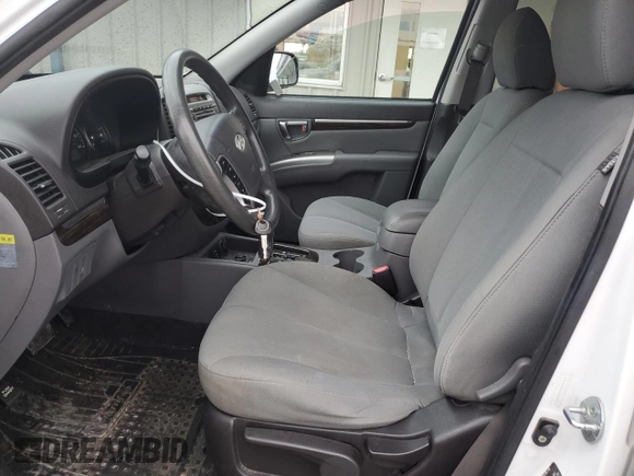 2011 Hyundai Santa Fe GLS z VIN 5XYZG3AB0BG024073, wystawiony jako Copart lot #56123915 z przebiegiem 138 594 mil mil oraz Szkoda całkowita • Salvage title. Historia ofert i sprzedaży dostępna na DreamBid. Obrazek 7.