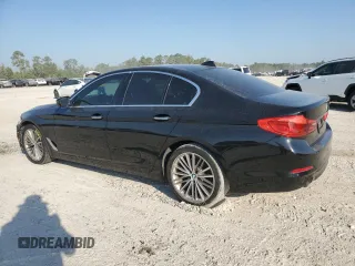 2018 BMW 5 Series 530i with VIN WBAJA5C54JG899845, listed as a Copart auction lot 76386124 with 57,379 mi miles and Salvage Title. Bid and sale history available at DreamBid. Image 2.