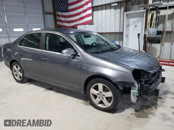 2009 Volkswagen Jetta SE with VIN 3VWRZ71K79M016032, listed as a Copart auction lot 59369445 with 177,075 mi miles and Salvage title. Bid and sale history available at DreamBid. Image 4.